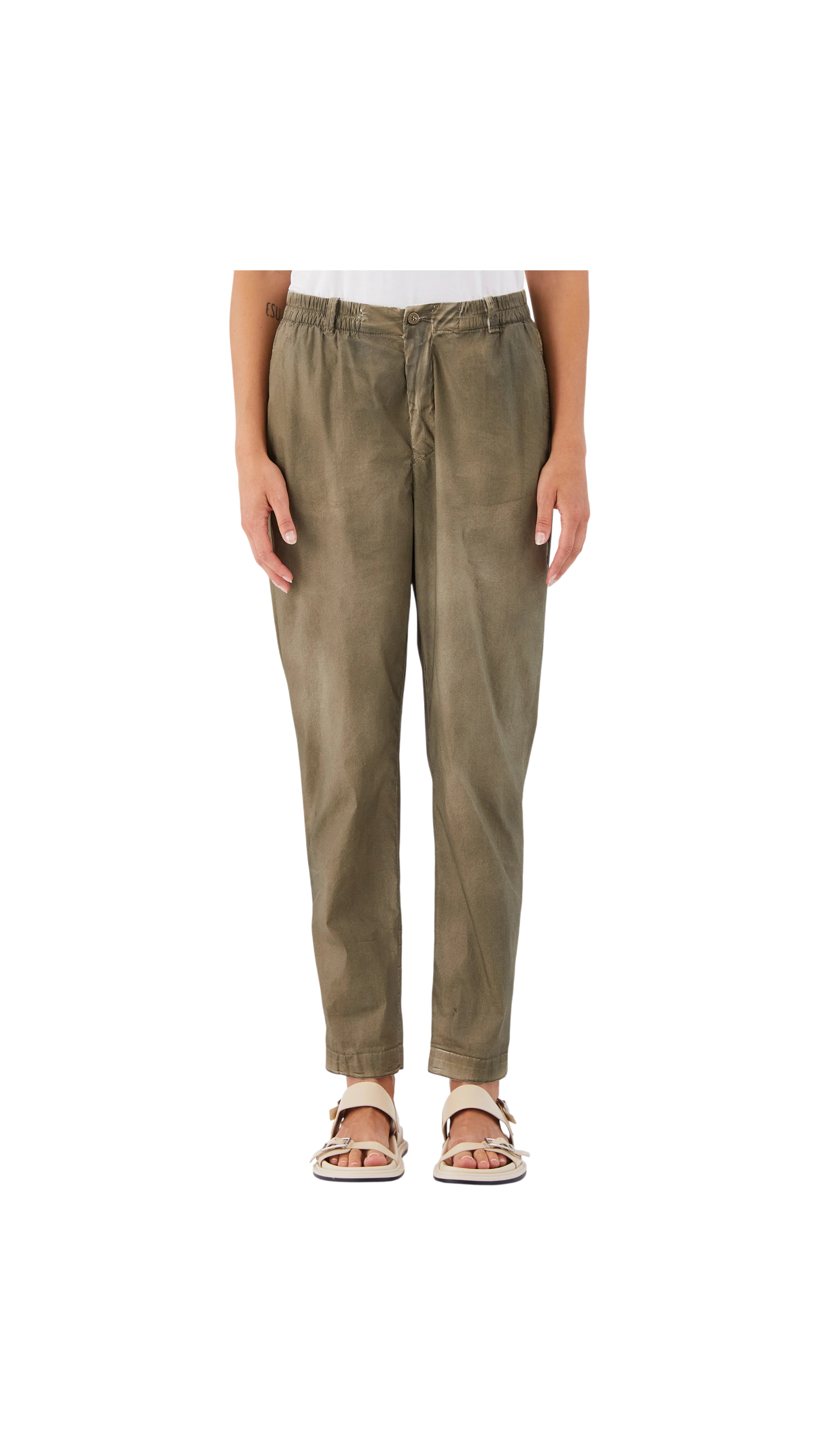 Person wearing olive green pants on a white background