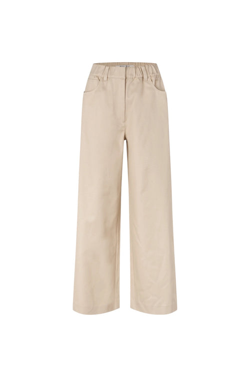 A pair of wide-leg cropped pants in a light beige or khaki color, featuring an elastic waistband, displayed on a clean white background.
